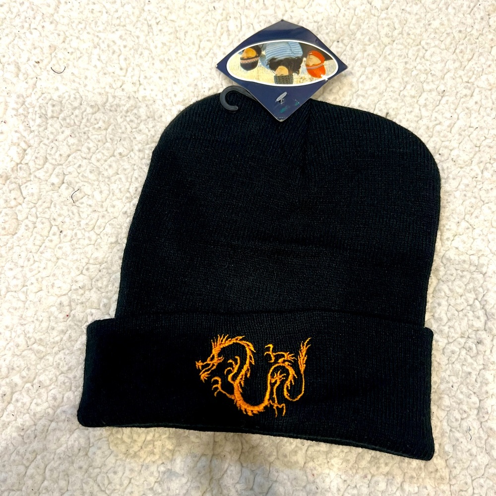 Black beanie with gold dragon. Brand new with tags.